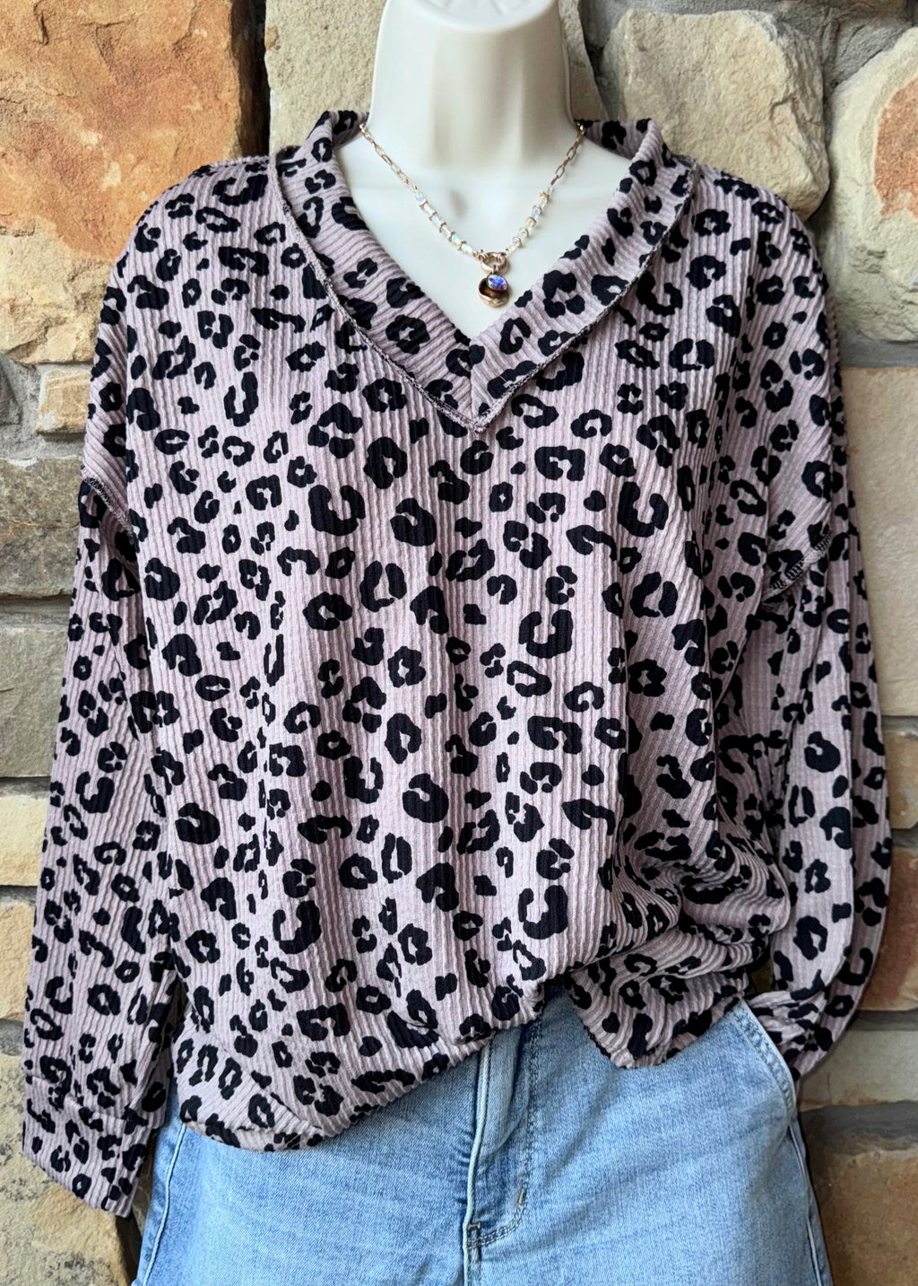 Leopard exposed hem top